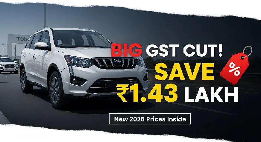 Mahindra XUV700 SUV with bold text ‘BIG GST CUT! SAVE ₹1.43 LAKH – New 2025 Prices Inside’ on a bright background, highlighting the new GST-reduced price.